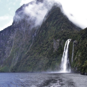 A beautiful waterfall in Milford Sound, New Zealand.