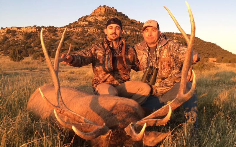 Two men posing after their New Mexico pronghorn hunt.